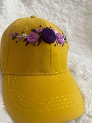 Mustard cap with lavender flowers