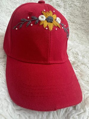Red cap with goldy theme